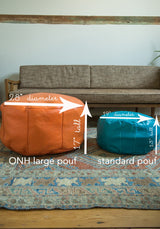 Size comparison: Large mustard yellow Moroccan pouf and a standard teal pouf.