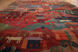 Detail of hand-knotted Tibetan folk art carpet, showcasing rich red, indigo, and green pictorial scenes.
