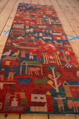 Hand-knotted Tibetan folk art runner, plush pile, with pictorial village scenes.