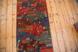 Hand-knotted Tibetan folk art rug with vibrant village and herding life scenes.