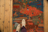 Plush Tibetan Folk Art runner with madder red and indigo blue village motifs.