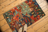 Vibrant hand-knotted Tibetan folk art rug with pictorial motifs, subtle carving, and natural dyes.