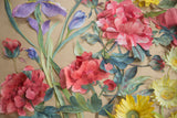 Hand-painted, hand-arranged 3D flowers with pink, purple, yellow blooms, and a green insect.