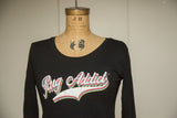 Scoop neckline and retro 'Rug Addict' graphic on the women's black long sleeve shirt.