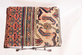Antique Rug Fragment Footstool, featuring circa 1900 Persian Khorassan Doroksh design in red, teal, and gold.