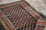 Vintage Northwest Persian Bijar rug, dark blue Mir motif field, coral laleh abassi border, 4' x 6'5