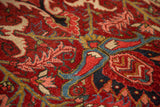 Vibrant jewel-tone palmette and floral motifs on a vintage Persian Ahar rug.