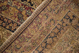 Antique Persian Kermanshah carpet close-up: intricate millefleur pattern, muted red, navy, ivory, wear.