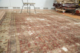 Antique Distressed Mahal carpet with copper, sand, and ivory tones, featuring a subtle Herati design.