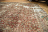 Hard distressed texture of antique Mahal carpet, with copper Herati pattern and exposed foundation.