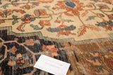 Antique Farahan carpet border detail, dark and light field with blush, blue, copper tones.