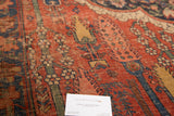 Aged brick red field with traditional stylized cypress tree motifs on a Persian Bijar carpet.