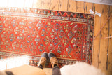 Persian antique Hamadan runner, cherry red field, germinating floral diamond lattice design.
