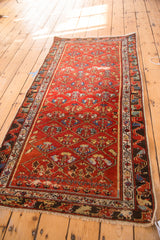 Antique Hamadan runner end, cherry red field, diagonal lattice with germinating flowers, foundation wear.