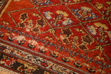 Antique Hamadan runner's finely woven border and cherry red field, with exposed foundation.