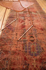 Anatolian rug runner geometric pattern detail with bold red, purple, and teal natural dyes.