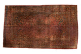 Vintage Meshed Persian rug, circa 1940, with large medallion on aged blush raspberry floral field.