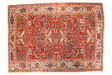 Hand-knotted Persian Heriz carpet with a cherry red allover geometric design.