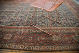 Intricate Herati motif and rich madder root red border of the antique Mahal rug.