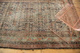 Antique Northwest Persian runner's intricate Herati design in navy, blush, and copper green with worn borders.