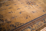 Vintage Peking carpet border with navy Greek key and scattered cobalt, silver motifs.