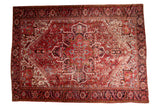 Hand-knotted Mehrivan carpet, cherry red field, oversized scalloped medallion, geometric florals, mostly even wear.