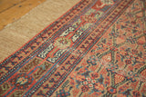 Vintage Hamadan runner: natural camel hair border, madder red, blue, navy patterns, and wear.