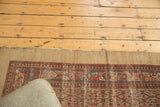 Vintage Hamadan runner: madder red lattice, navy blue details, natural camel hair border tatter.