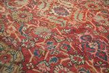Vintage Mahalati carpet's inverted Herati motif and lotus palmettes in cherry red and navy.