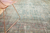 Distressed aesthetic of the vintage Mahal rug, revealing pale aqua blue and faded red hues.