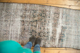 Vintage Distressed Mahal runner with faded Herati motif, exposed foundation, and irregular edges.