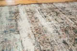 Vintage distressed Mahal rug surface, highlighting exposed foundation with muted blush and slate blue.