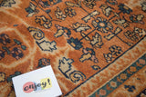 Hand-knotted vintage Mahal carpet, terra cotta field with scrolling vinery, arabesques, and blue.