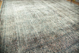 Distressed vintage Meshed rug pile, foundation visible with denim blue, peach, red.
