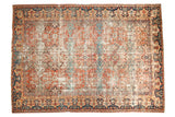 Antique Sultanabad carpet, sprawling pattern, timeworn terra cotta, blue, and ivory.