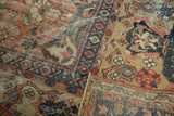 Hand-knotted Persian Sultanabad detail: exposed knot heads, textured wear, terra cotta patterns.