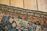 Vintage hand knotted Persian Meshed rug pile and dense weave with saffron, navy, and ivory golfarang motif.