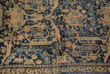 Vintage Meshed rug's evenly worn navy golfarang pattern with saffron yellow and sky blue.
