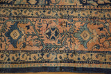 Blush, navy, sky blue golfarang rose motif, patterned border, and short pile.