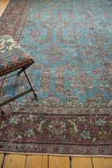 Vintage Mahal rug with burgundy floral border and unique aqua blue field showing exposed knot heads.