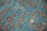 Brilliant aqua blue vintage Mahal field with repeating burgundy floral motifs and evident pile wear.