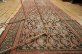 Traditional early 20th century Malayer runner with paisley boteh design and tattered edge.