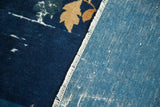 Vintage Chinese Peking rug with cobalt blue pile, ivory leaf, and sky blue woven back.