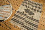 Vintage hand knotted Kurdish rug with ivory, charcoal, and black banded stripes and offset geometric motif.