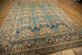 Antique Jalili Tabriz rug corner, curvilinear serrated leaves and intricate rust, blue, ivory borders.