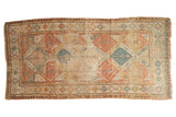 Antique Soumac carpet, faded geometric lattice in terra cotta, blue, and ivory. 5'6