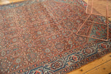 Vintage Malayer rug showcasing floral samovar, serrated leaf motifs, madder red, and indigo.