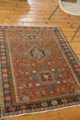 Vintage Karaja rug corner: geometric border, restored fringe, with mostly even pile wear.