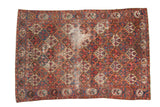 Vintage Baktiari carpet, red and blue panel field with trees, love birds, and wear.