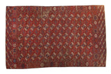 Distressed antique Tekke carpet, brick red with navy and mallard green gul motifs, 6'10